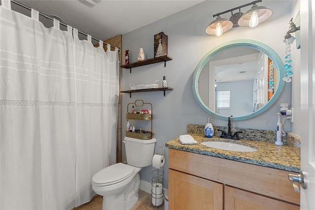 bathroom featuring vanity, baseboards, a shower with curtain, and toilet