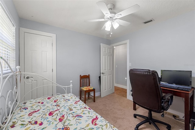 bedroom with visible vents, carpet, ceiling fan, and baseboards