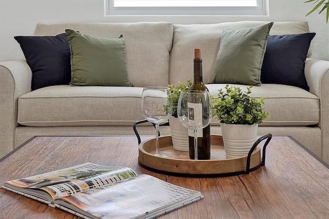 living room featuring a wealth of natural light and hardwood / wood-style floors