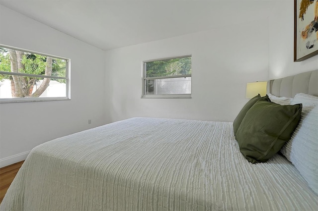 bedroom featuring hardwood / wood-style floors