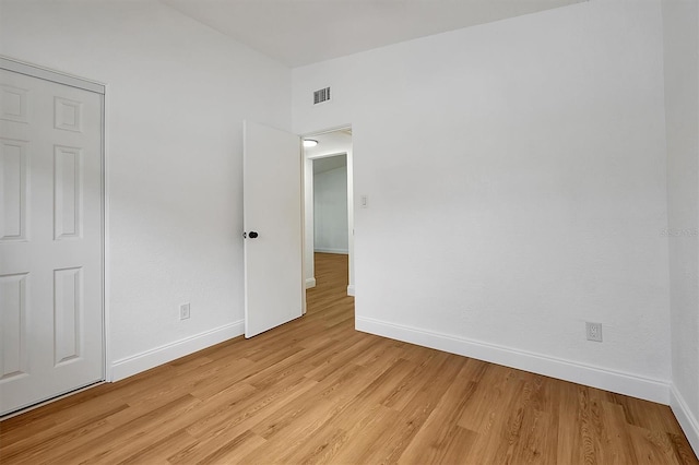 empty room featuring light hardwood / wood-style floors