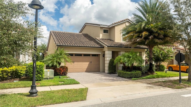 mediterranean / spanish-style house featuring a garage