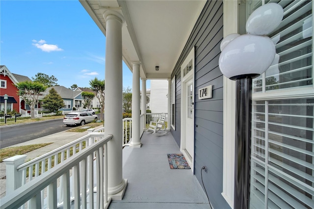 balcony featuring covered porch