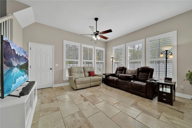 living room with lofted ceiling and ceiling fan