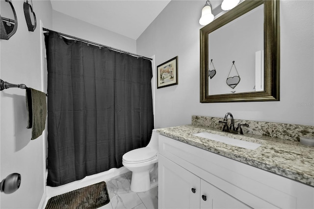 bathroom featuring vanity, toilet, and a shower with shower curtain