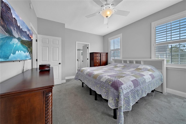 bedroom featuring connected bathroom, ceiling fan, and carpet floors