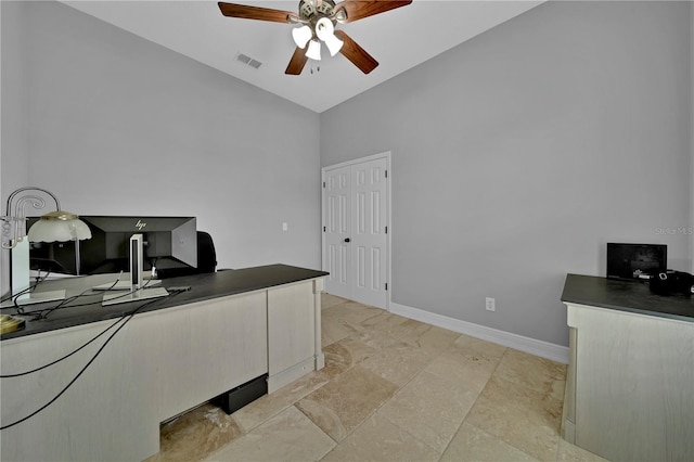 home office featuring ceiling fan and vaulted ceiling