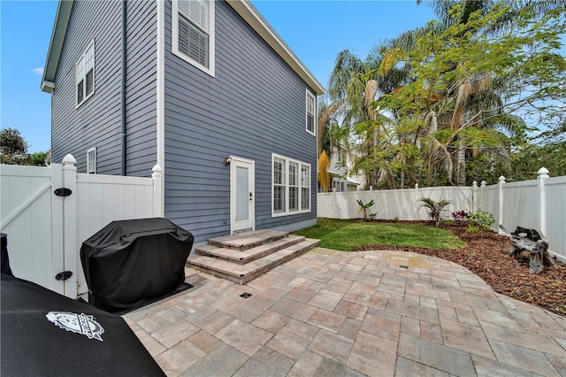 view of patio featuring a grill