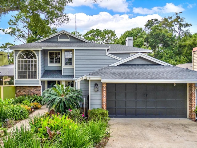 view of front of property featuring a garage