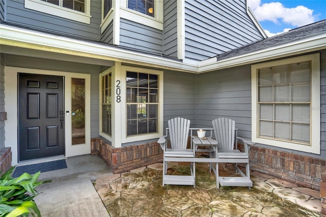 property entrance featuring covered porch