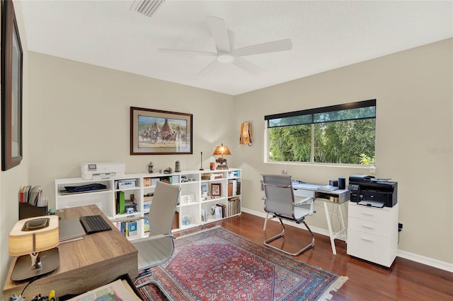 office area featuring ceiling fan and dark hardwood / wood-style flooring