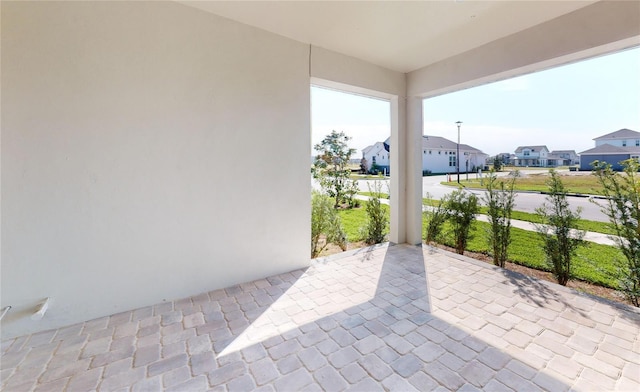 view of patio with a residential view