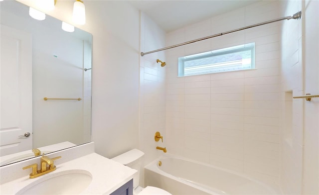 full bathroom with shower / bathing tub combination, vanity, and toilet