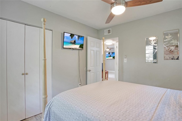 bedroom with ceiling fan and light hardwood / wood-style flooring