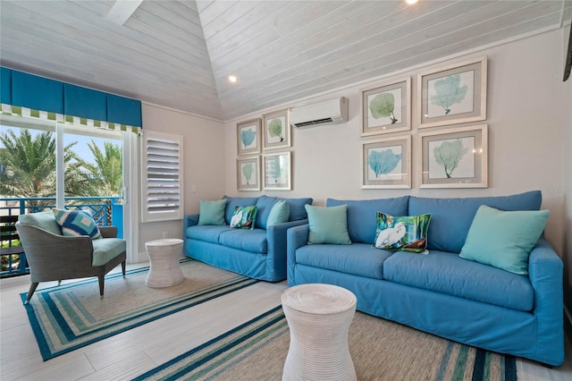 living room with lofted ceiling, a wall unit AC, and recessed lighting