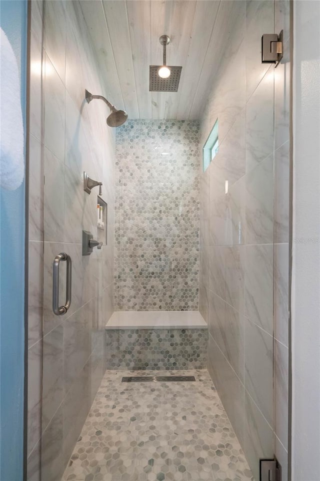 bathroom with a stall shower