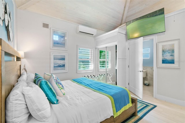 bedroom with wood ceiling, a wall unit AC, light hardwood / wood-style floors, and vaulted ceiling with beams