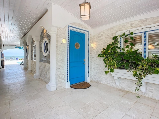 entrance to property featuring covered porch