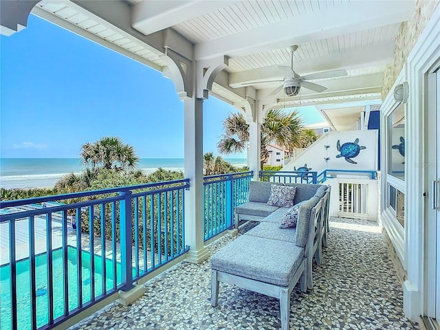 balcony with an outdoor hangout area, a water view, and ceiling fan
