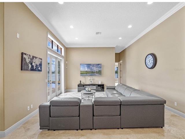 living area featuring baseboards, ornamental molding, and recessed lighting