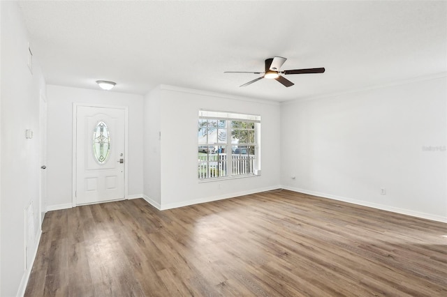 foyer entrance featuring ceiling fan and hardwood / wood-style flooring