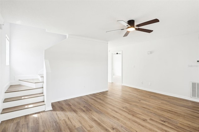 unfurnished room featuring ceiling fan and light hardwood / wood-style flooring