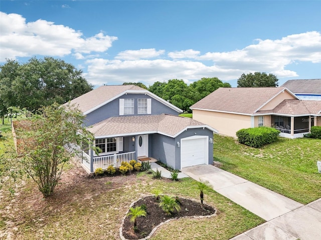 view of front of house with a garage, a porch, a sunroom, and a front lawn