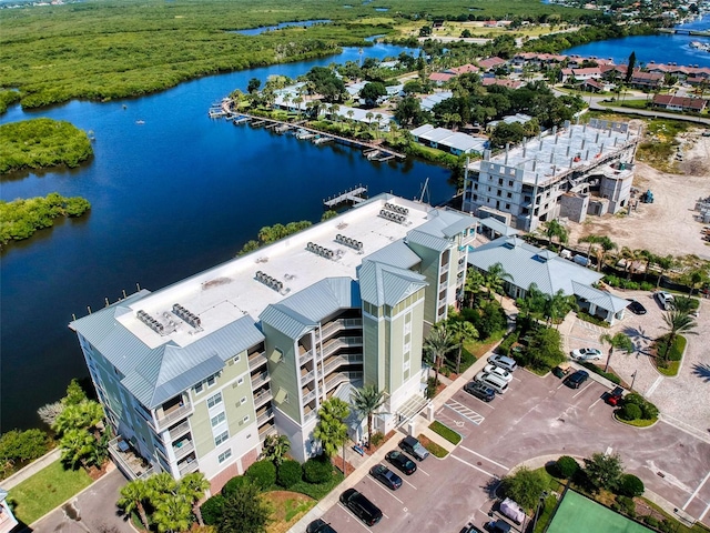 drone / aerial view with a water view