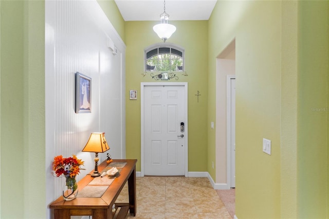 entrance foyer featuring light tile patterned floors