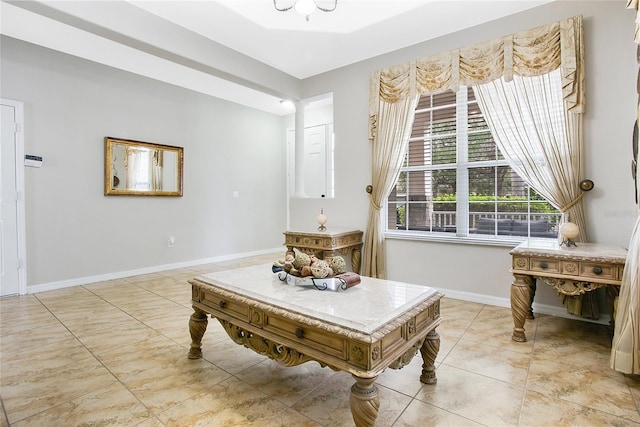 sitting room with ornate columns