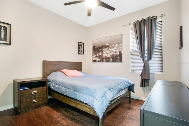 bedroom featuring ceiling fan and dark hardwood / wood-style flooring