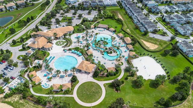 birds eye view of property featuring a residential view and a water view