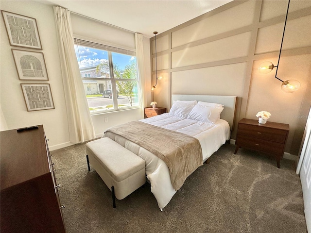 carpeted bedroom with coffered ceiling