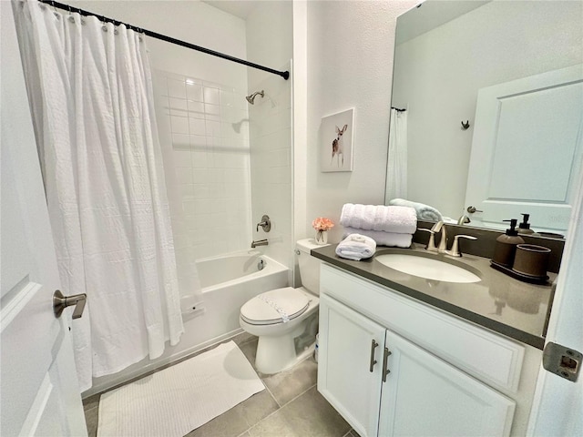 full bathroom featuring tile patterned floors, toilet, shower / tub combo with curtain, and vanity