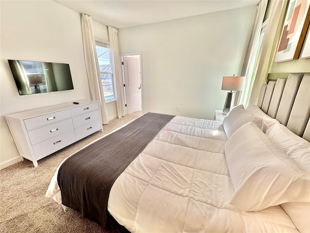 9095 Sommerset Hills Dr, Davenport, FL 33896 - bedroom with light colored carpet and baseboards