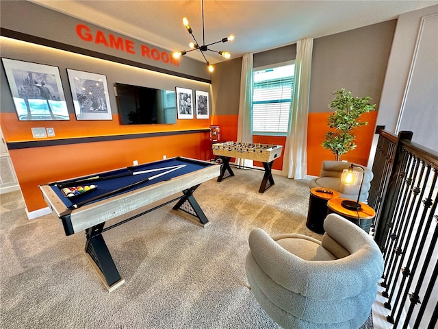 recreation room featuring billiards, a chandelier, and carpet floors