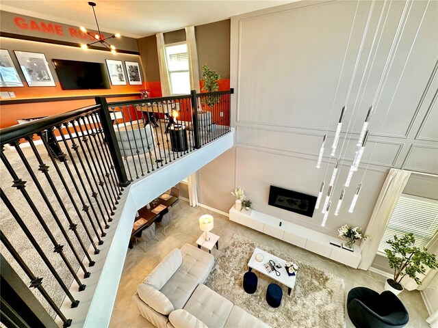 living room featuring a chandelier