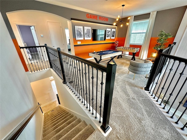 9095 Sommerset Hills Dr, Davenport, FL 33896 - playroom with arched walkways and carpet floors
