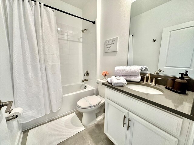 full bathroom featuring toilet, shower / tub combo with curtain, and vanity