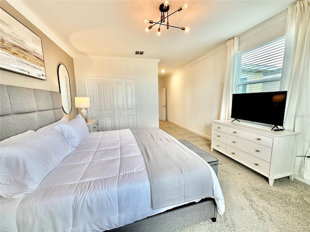 bedroom with light carpet, ornamental molding, an inviting chandelier, and a closet