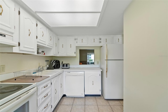 kitchen featuring light tile patterned flooring, sink, white cabinets, white appliances, and extractor fan