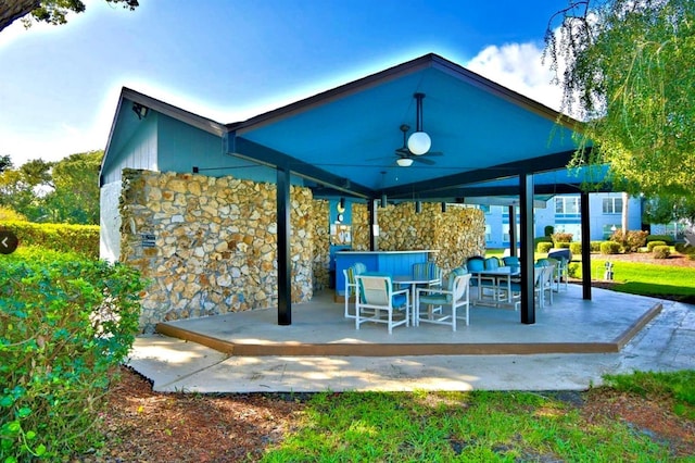 view of patio with ceiling fan