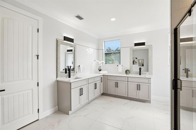 bathroom with vanity and crown molding