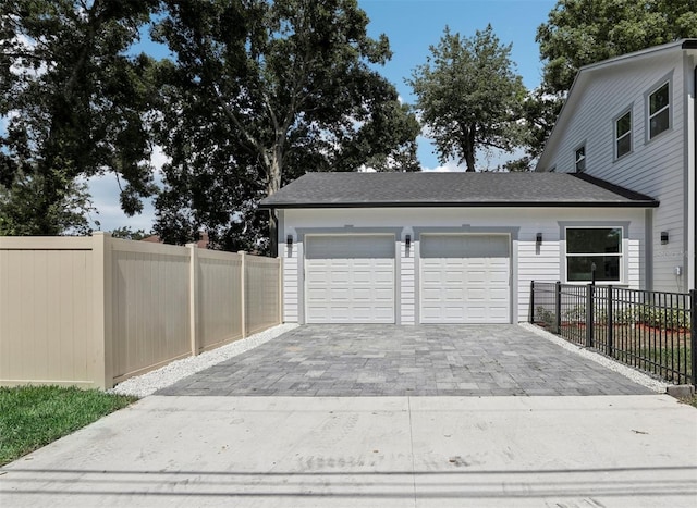 garage featuring wooden walls