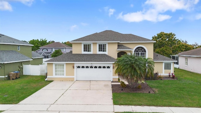 front facade featuring a garage and a front yard