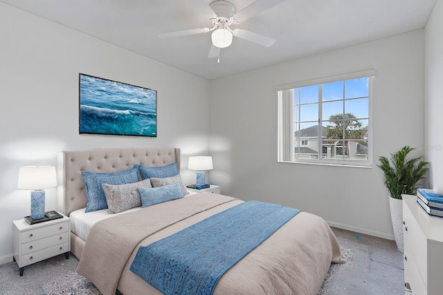 bedroom featuring light carpet and ceiling fan