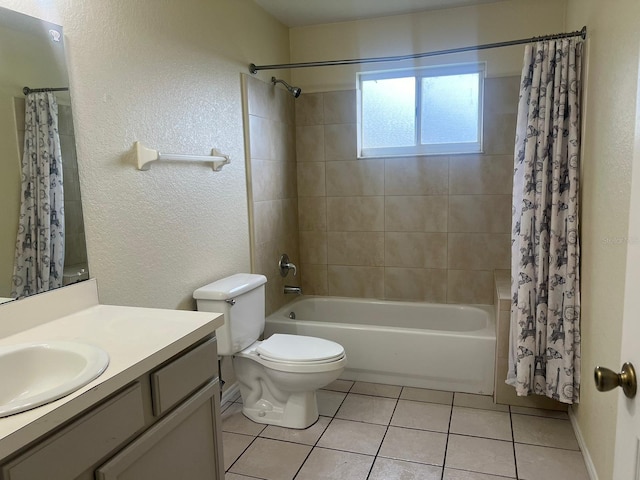 full bathroom featuring tile patterned flooring, vanity, toilet, and shower / bath combo