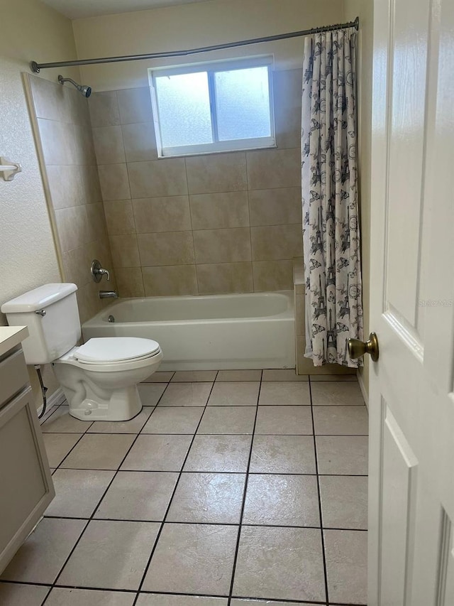 full bathroom with vanity, toilet, shower / tub combo, and tile patterned floors