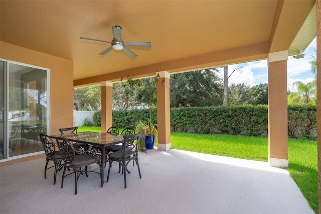 view of patio featuring ceiling fan