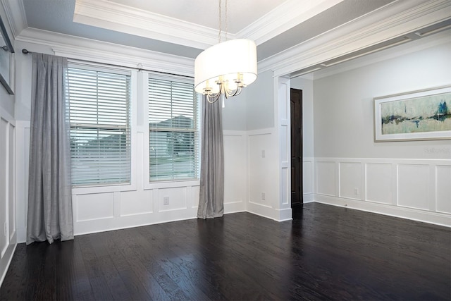 interior space with ornamental molding, a notable chandelier, and dark hardwood / wood-style flooring